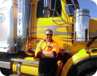 Man beside truck - Petersen Tippers in Farleigh, QLD	