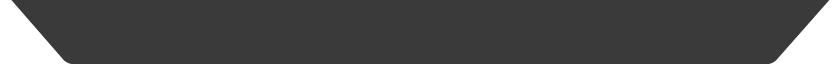 A dark gray rectangular shape, wider at the top and slightly narrower at the bottom.