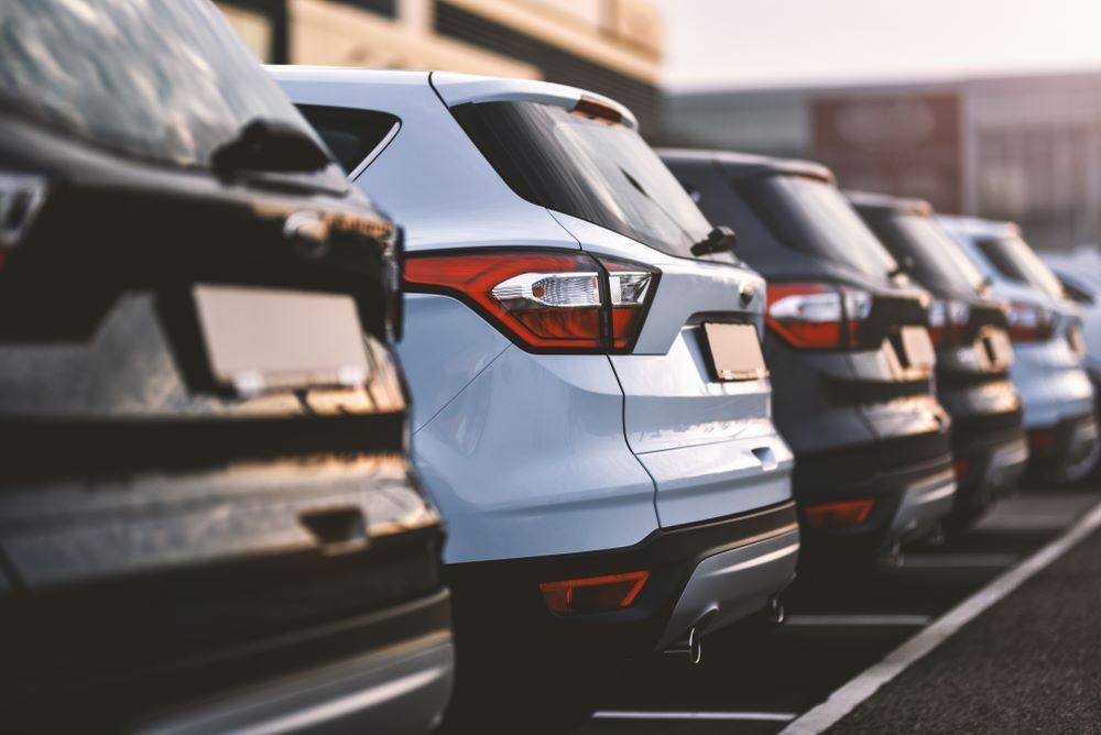 A Row of Cars Are Parked in A Parking Lot | Sell Any Car Fast Brisbane, QLD