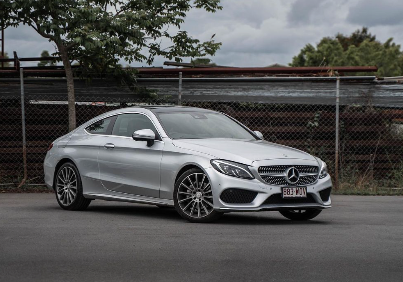 A Silver Mercedes Benz C Class Coupe Is Parked on The Side of The Road  — sold to Sell Any Car Fast In Eagle Farm, QLD