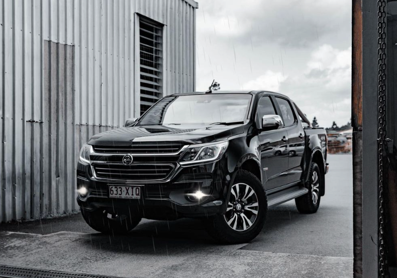 A black Holden Colorado Is Parked in Front of A Building - sold to Sell Any Car Fast In Eagle Farm,QLD