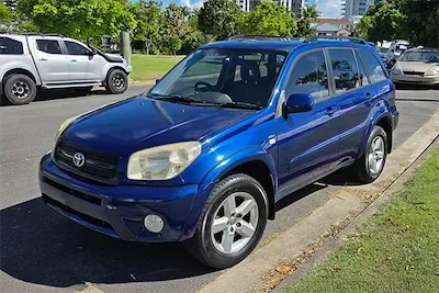 A blue 2004 Toyota RAV4 bought be Sell Any Car Fast