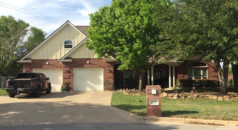 House with Car — Stephenville, TX — Bill Cogburn Construction, Inc.