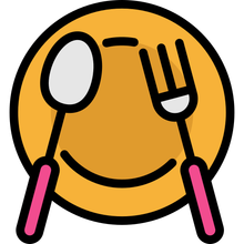Piatto giallo con cucchiaio e forchetta che disegnano un volto sorridente.