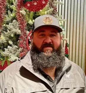 man with light grey hat