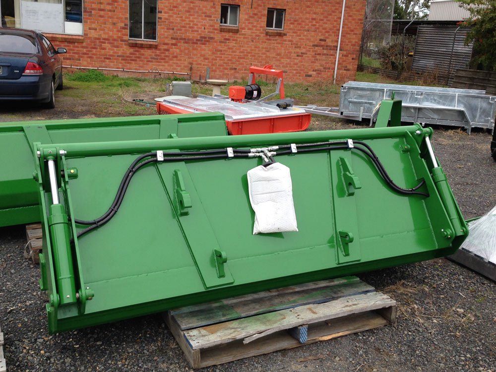Green 4 in 1 Buckets 2 -- Machinery Repair Service in Wingham, NSW