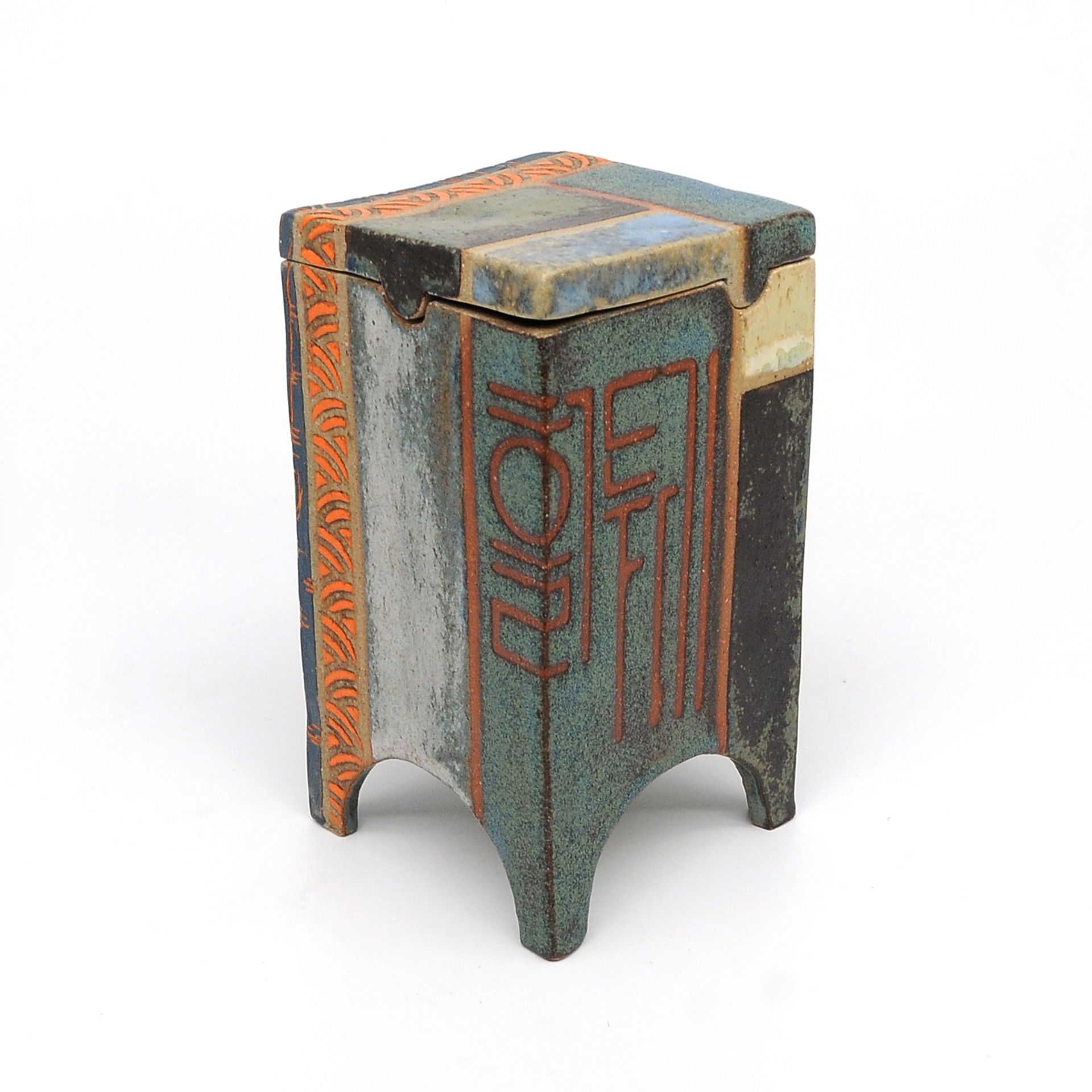 A small stoneware ceramic with a lid on a white background.