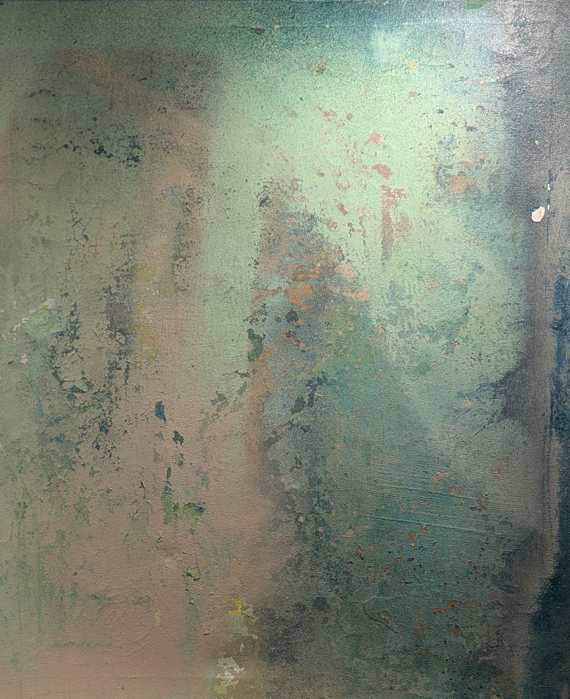 Abstract blurry teal and beige textured surface with vertical dark edge on the right