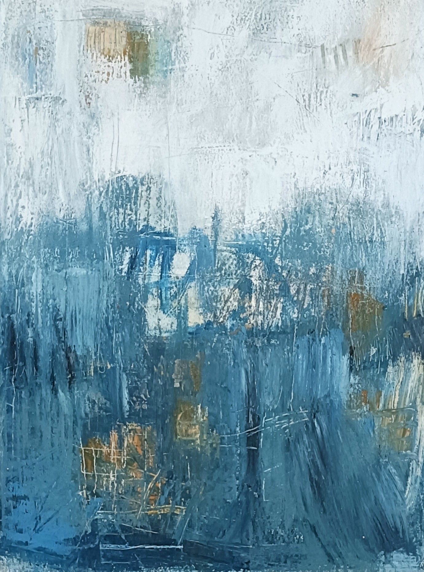 A blue and orange painting on a white surface.