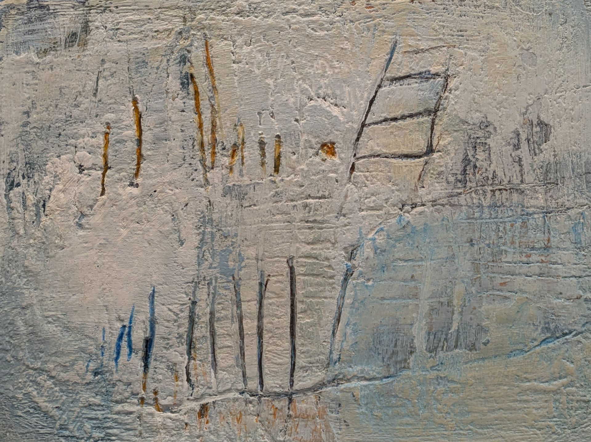 A close up of a wall with graffiti on it