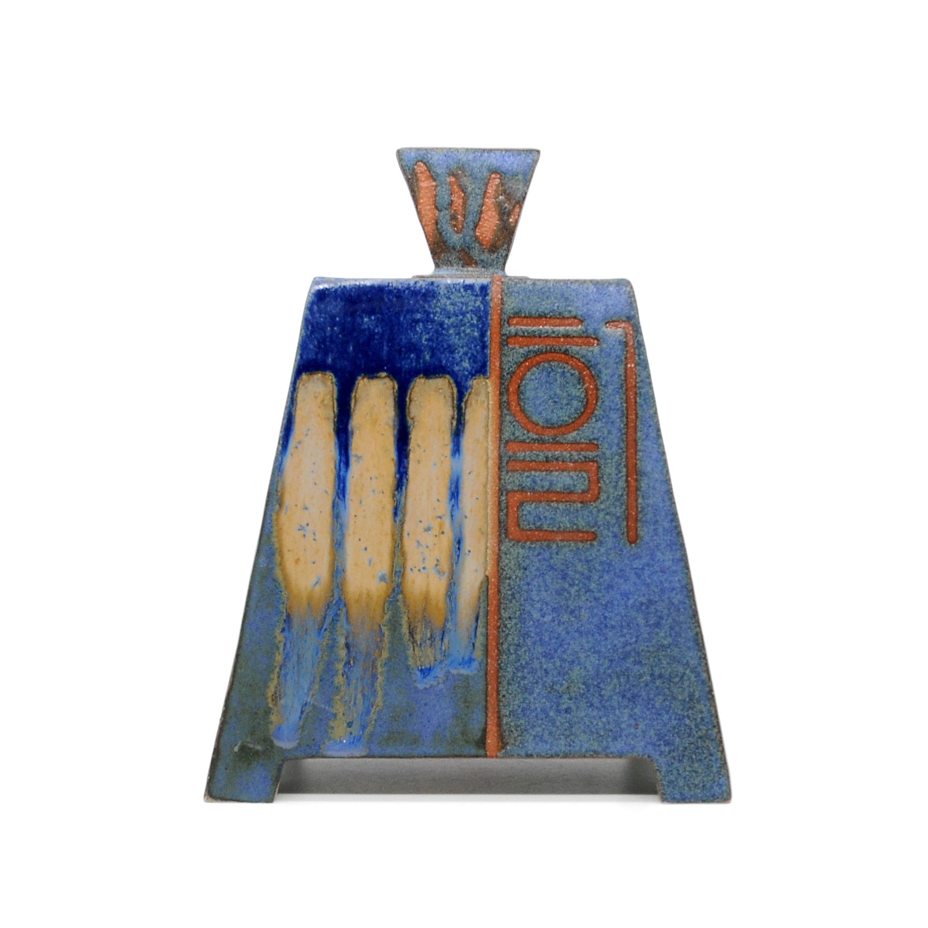 Blue and tan ceramic sculpture with geometric shapes and dripped glaze.
