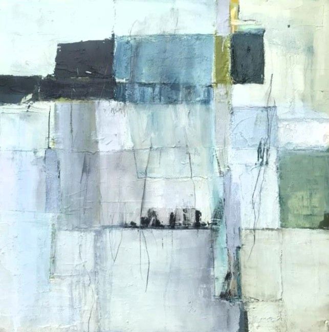 A close up of a painting of yellow and gray squares on a wall.