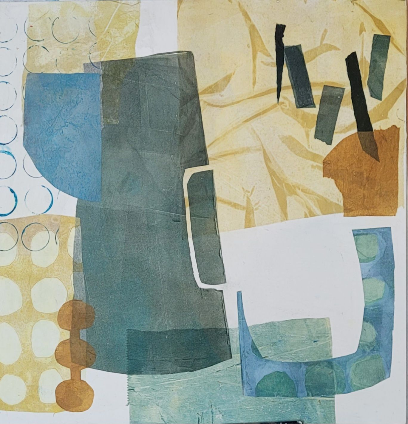 A painting with a few pieces of paper on it