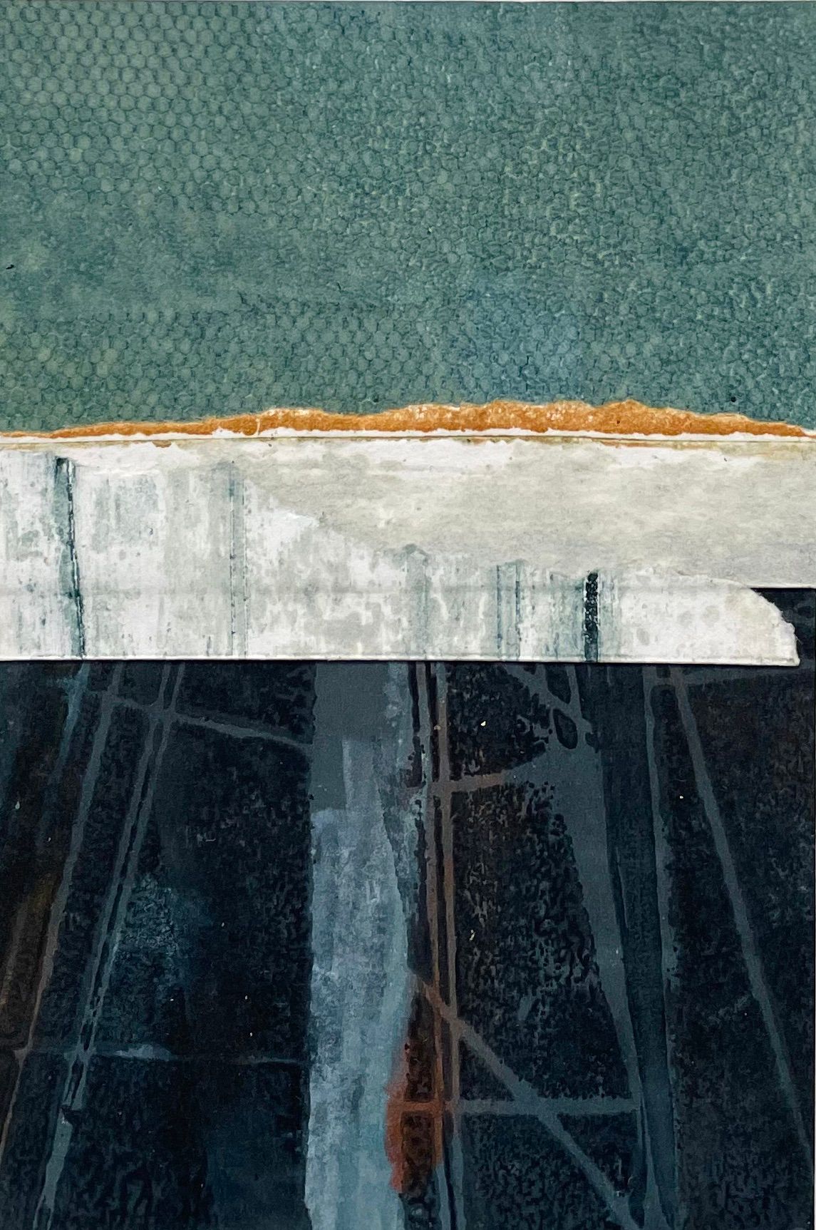 An aerial view of a swimming pool with a reflection of a building in the water.