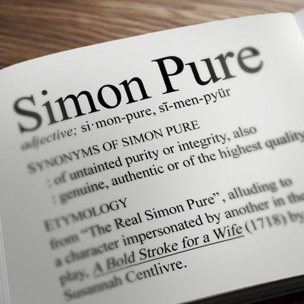 A book is open to a page that says simon pure