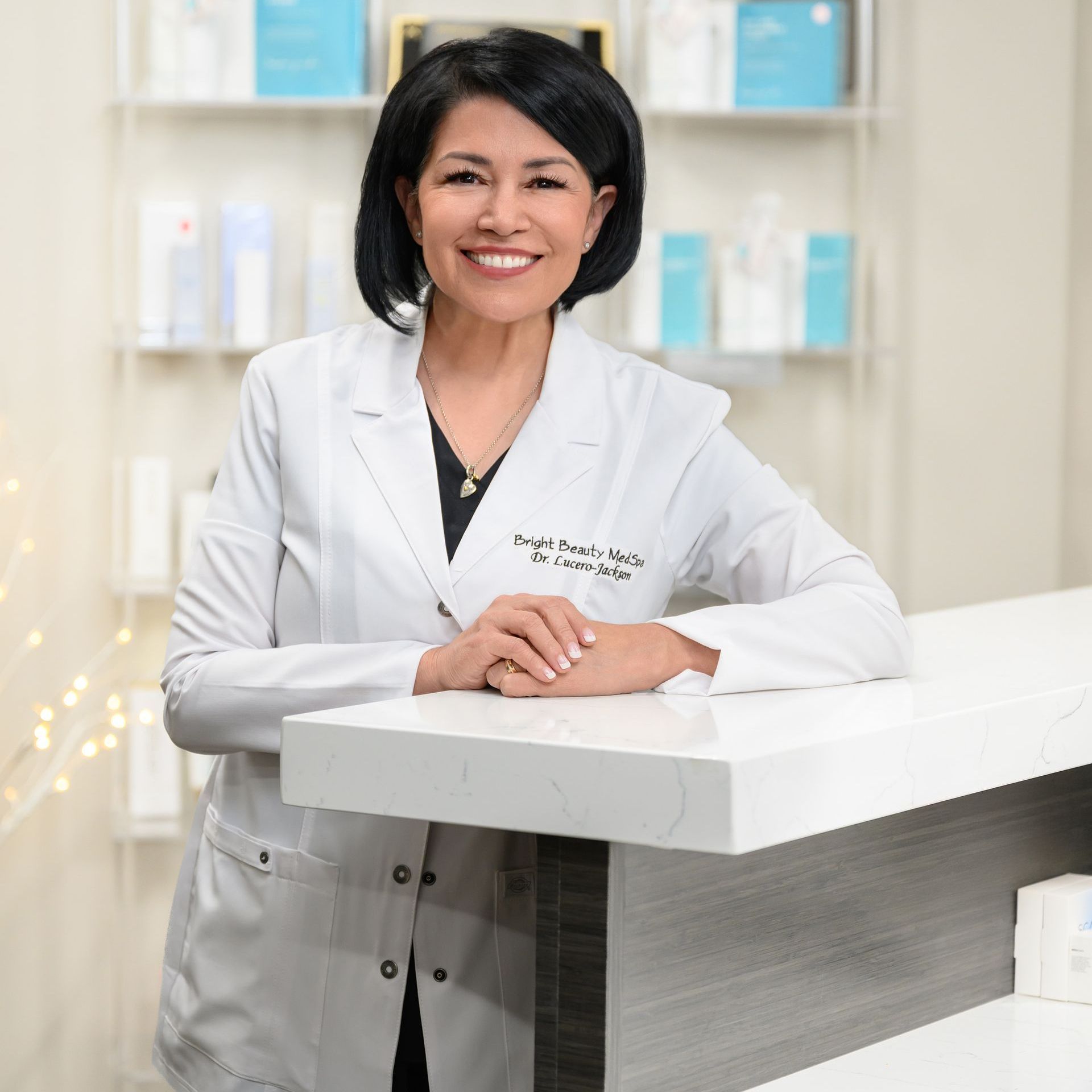 A close up of a woman 's face with her hands on it