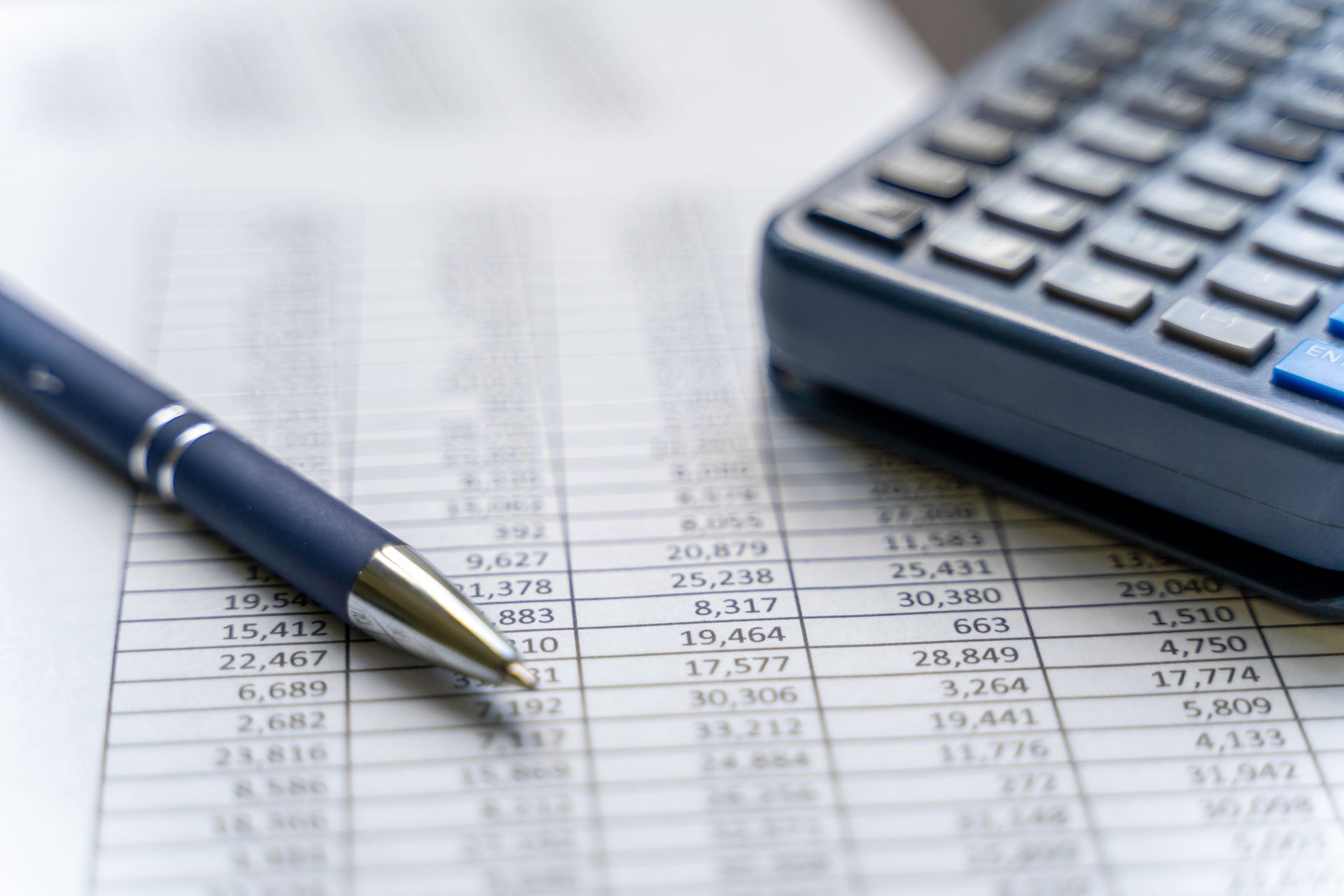 Accounting table with pen and calculator | Accounting Services | Perth, WA