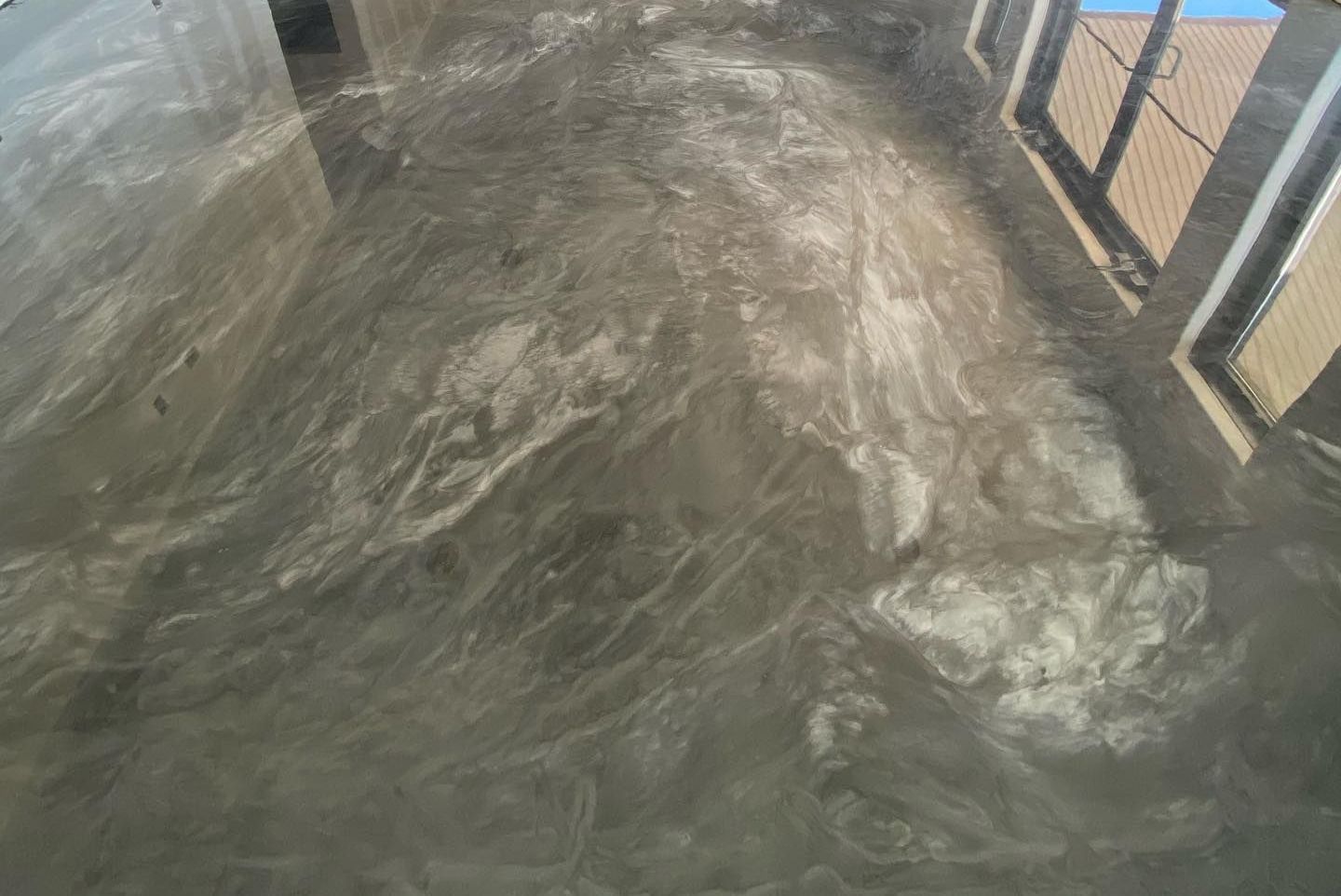 a close up of a concrete floor in a room .