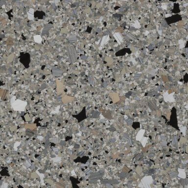 a close up of a gray and black granite counter top