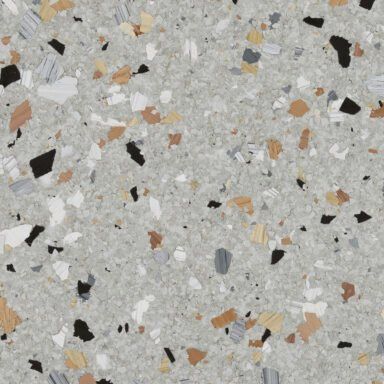 a close up of a terrazzo floor with a gray background