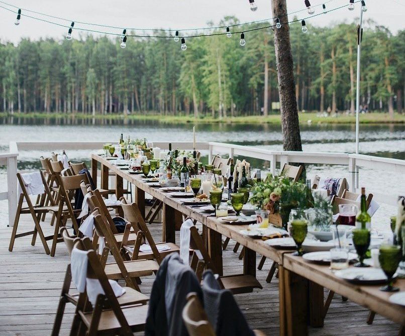 A Long Table With a Lot of Plates and Glasses on It — The Larder Byron Bay in Byron Bay, NSW