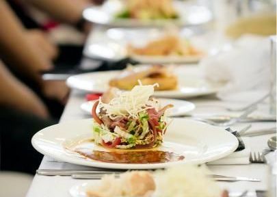 A Plate of Food is Sitting on a Table — The Larder Byron Bay in Byron Bay, NSW