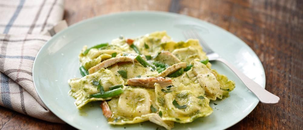 A Plate of Ravioli With a Fork on a Wooden Table — The Larder Byron Bay in Byron Bay, NSW