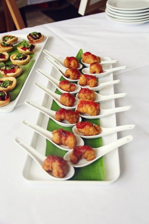 A Tray of Food on Spoons on a Table — The Larder Byron Bay in Byron Bay, NSW