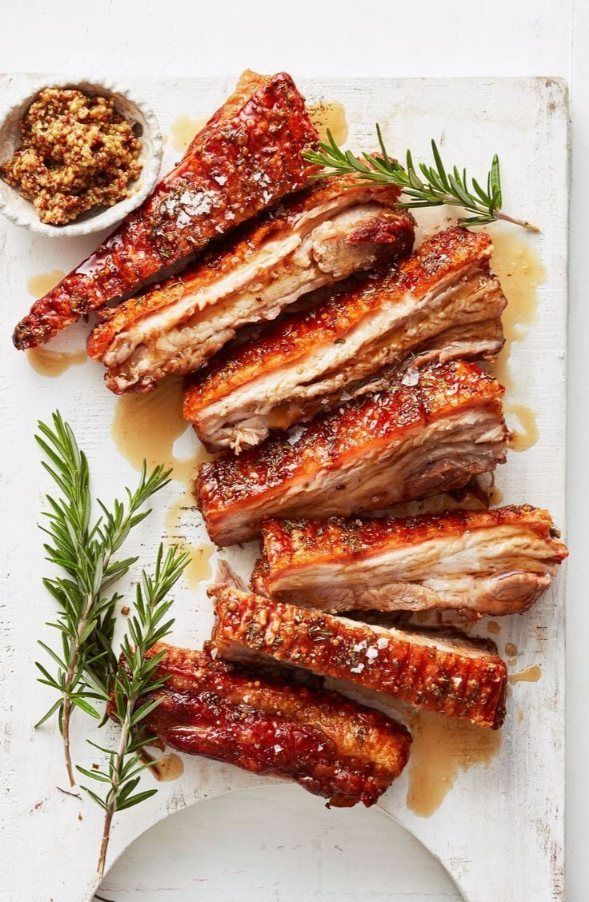 The Ribs Are Stacked on Top of Each Other on a Cutting Board — The Larder Byron Bay in Byron Bay, NSW