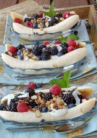 Three Banana Boats Filled With Berries and Nuts on a Table — The Larder Byron Bay in Byron Bay, NSW