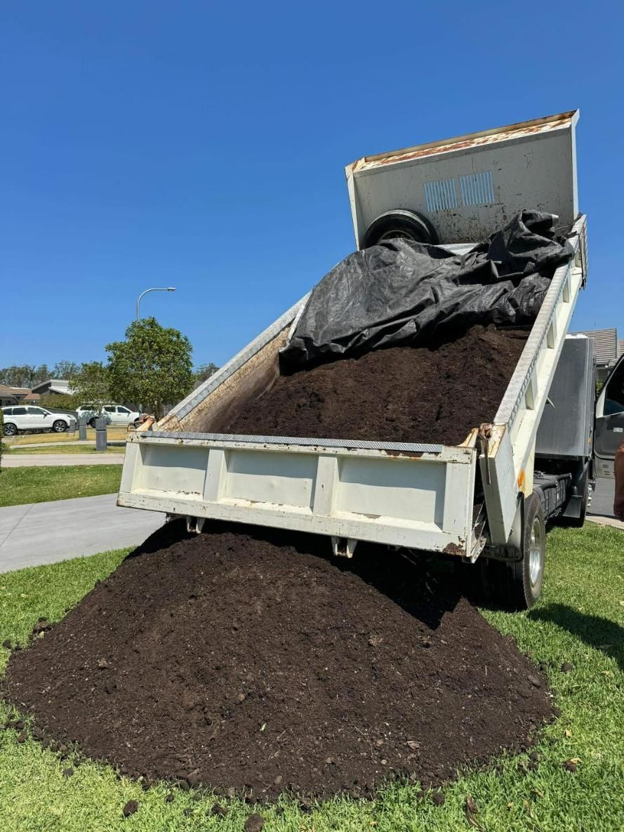 Tipper Truck Loaded With Pile Of Soil — Port Tipper & Driver In Port Macquarie, NSW