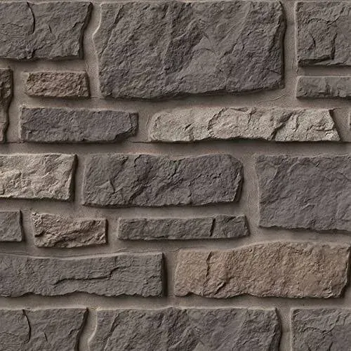 A close up of a brick wall with a lot of bricks on it.