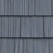 A close up of a gray shingle roof.