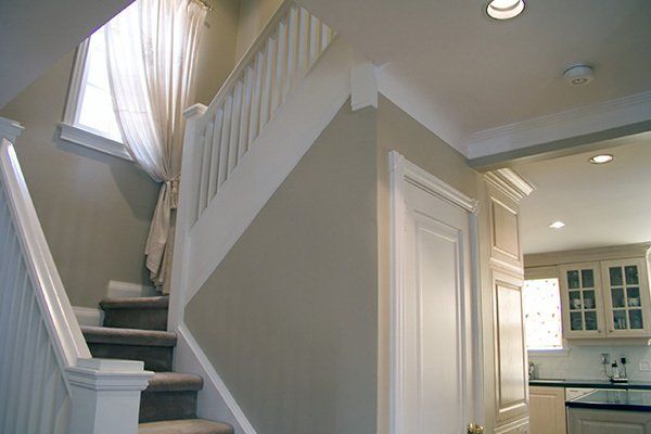interior painting of stairwell and kitchen
