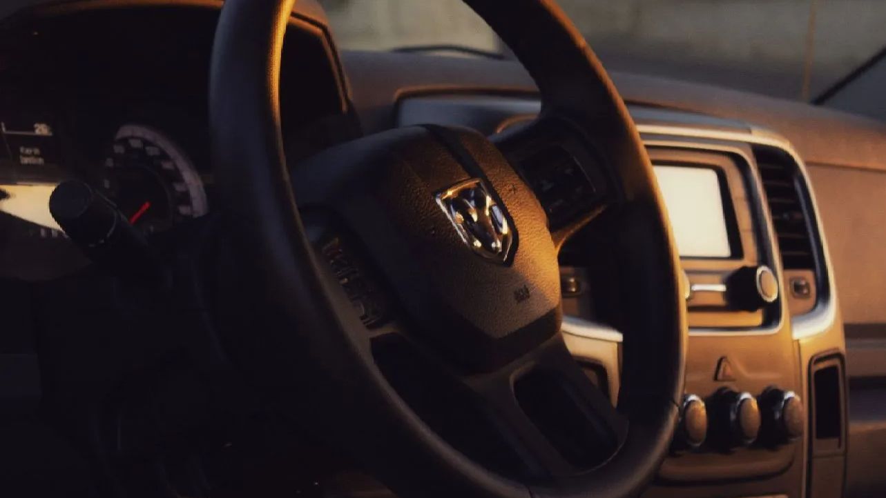 A close up of a dodge ram steering wheel