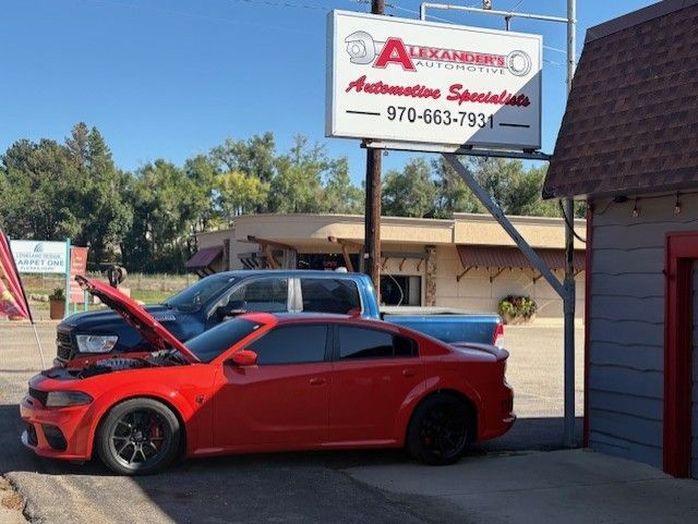 Red Car with Hood Up