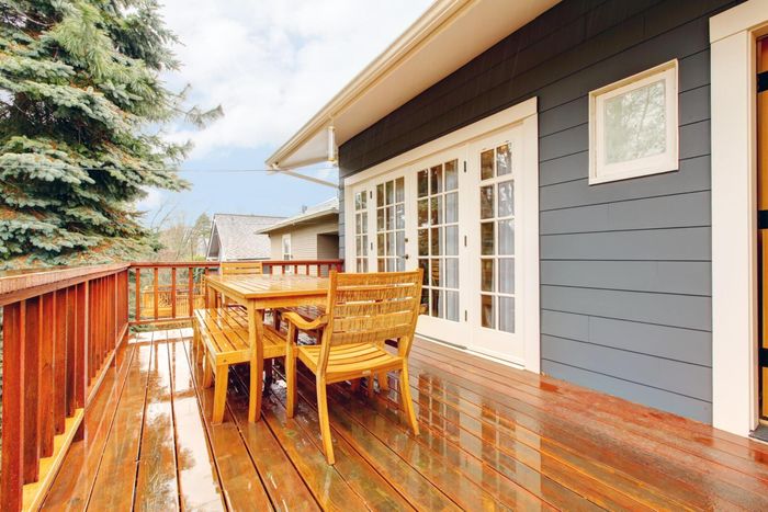 a newly furnished wooden deck