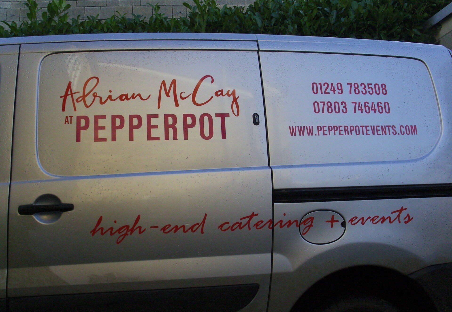 white van with red logo