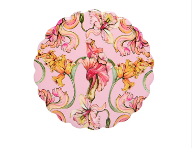 Pink floral pattern on a scalloped edge coaster with pink, orange, and yellow flowers.