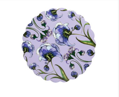 Pink floral pattern on a scalloped edge coaster with pink, orange, and yellow flowers.