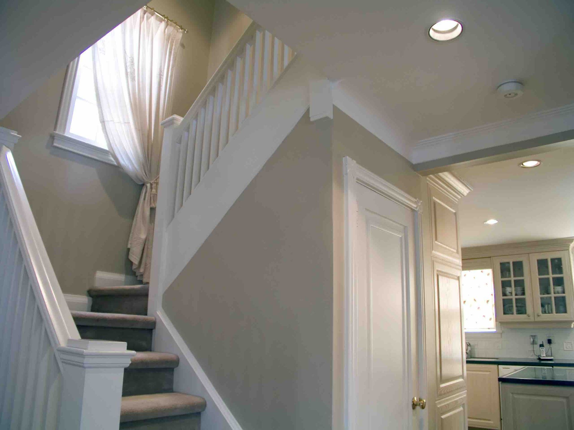A staircase leading up to the second floor of a house
