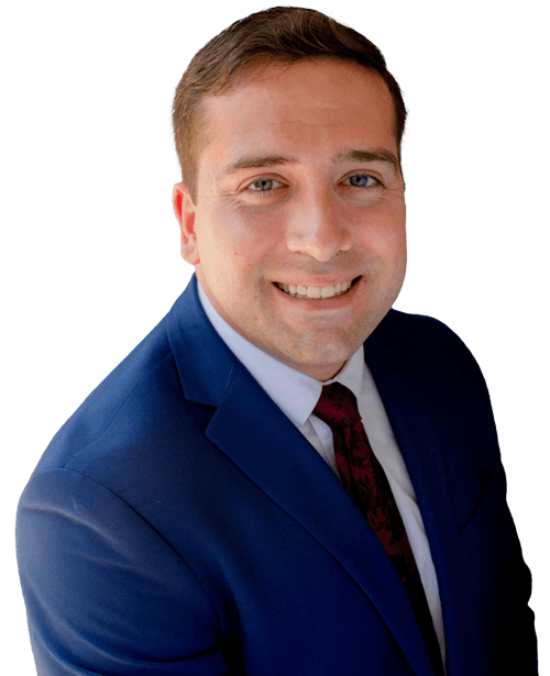 Group of seven people standing in front of a building with glass doors and the number 3011.