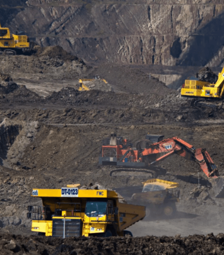 trucks and machines in coal mine in Queensland