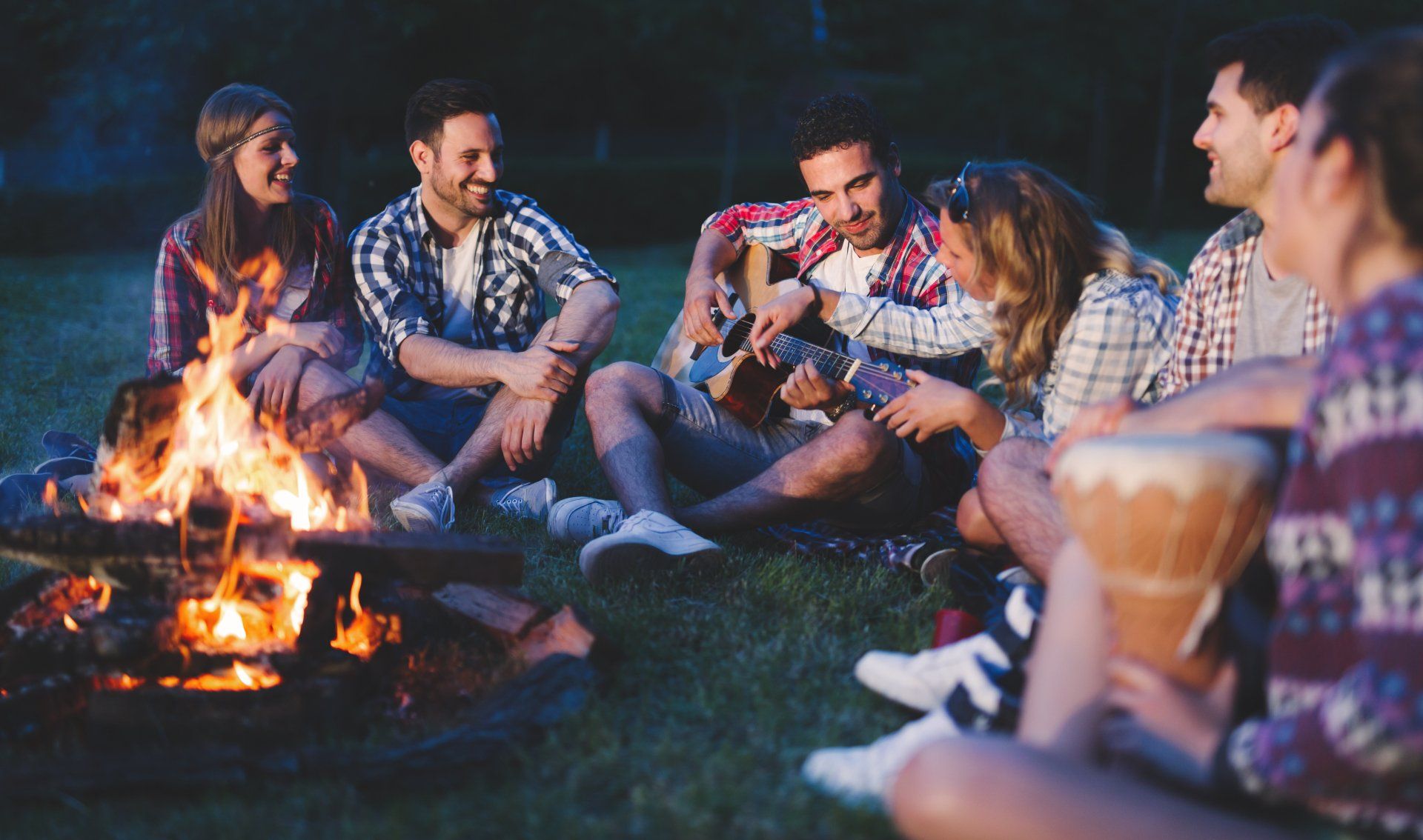 Navigating anxiety by hanging out with friends around a bonfire