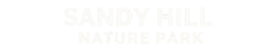 A white logo for sandy hill nature park on a white background.
