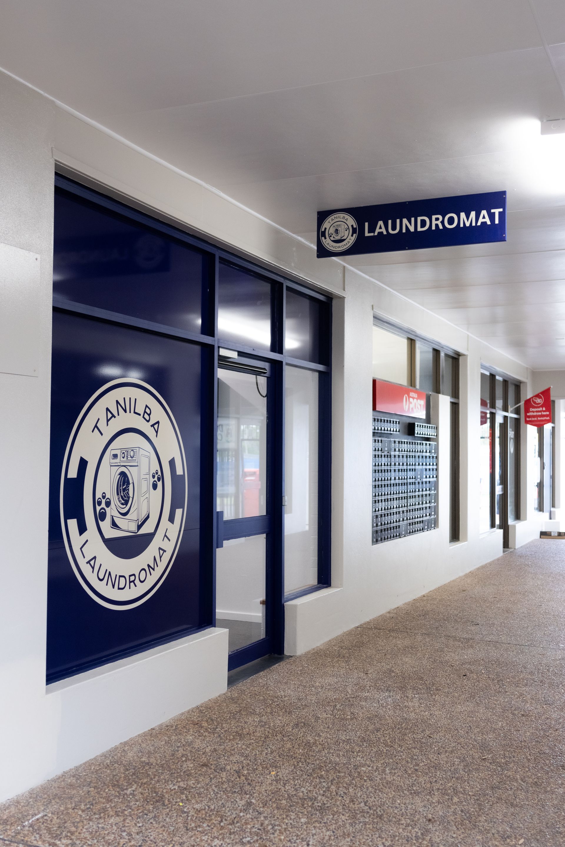 A laundromat is located in a shopping mall — Tanilba Bay Laundromat In Tanilba Bay, NSW