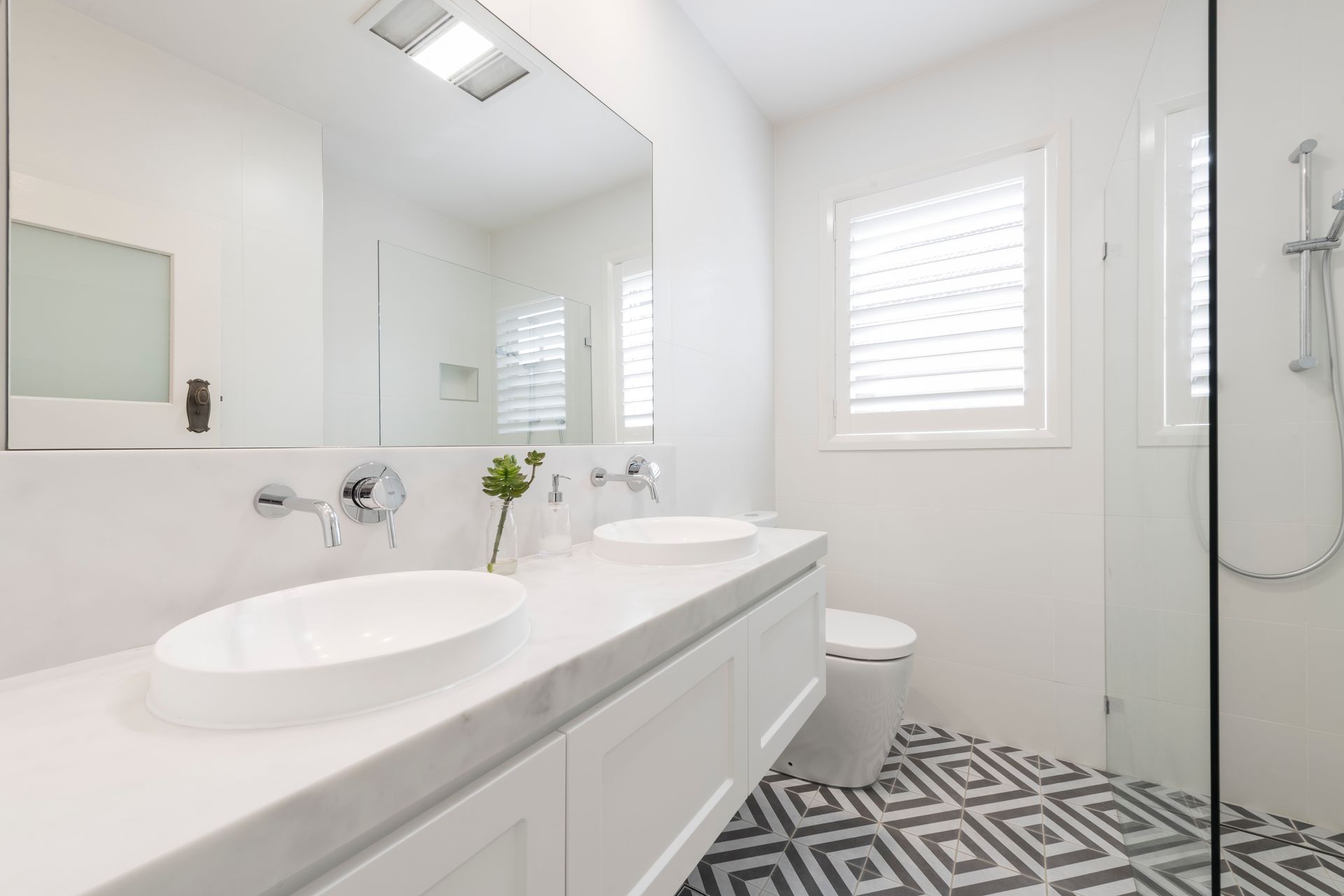 Modern White Bathroom With Double Sinks, Patterned Floor Tiles — Indie Living In Lake Macquarie, NSW