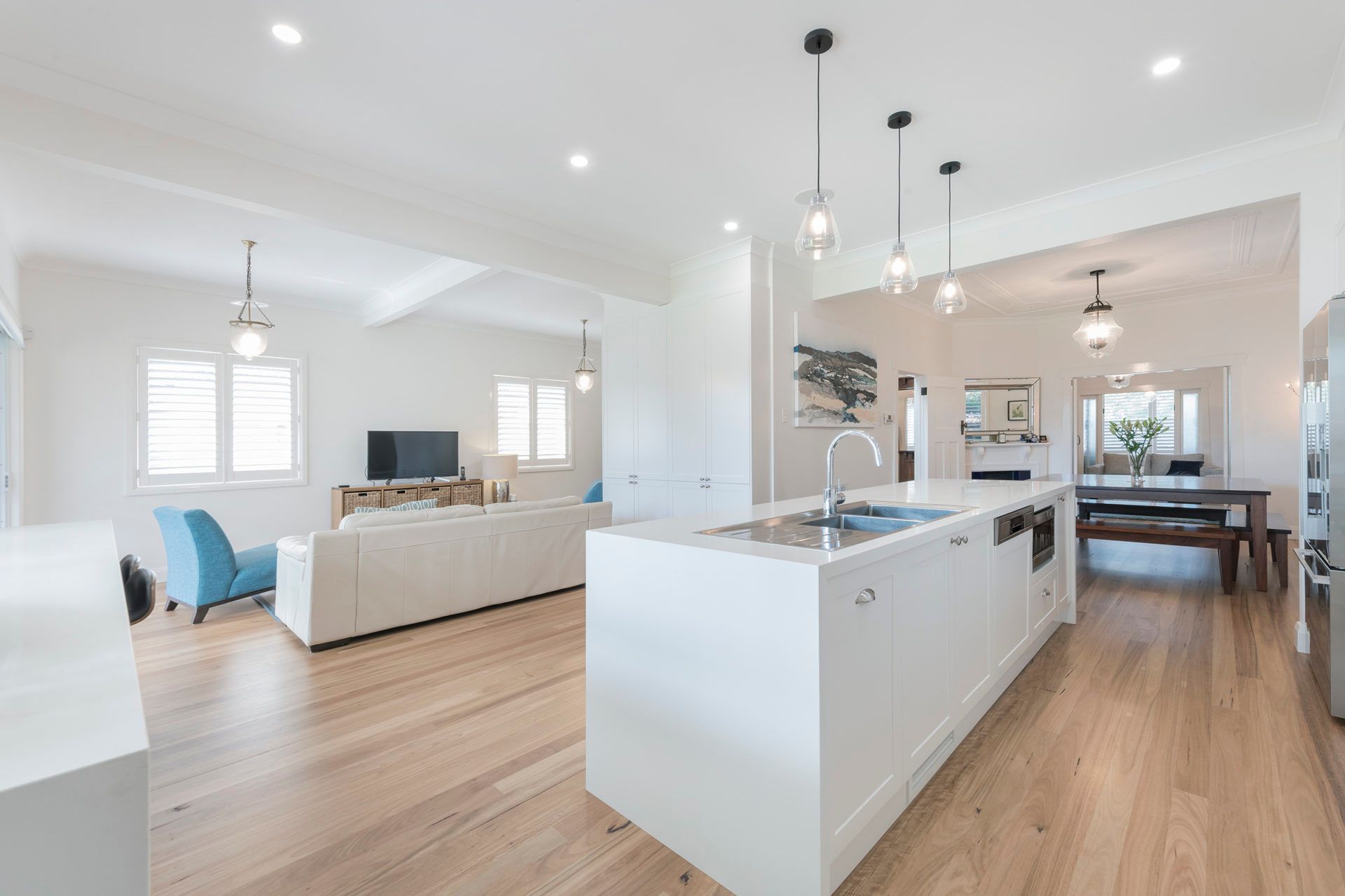 A Kitchen With a Large Island in the Middle of the Room — Indie Living In Bennetts Green, NSW
