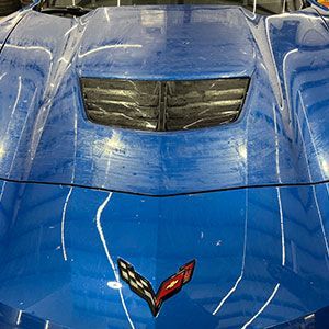 a corvette before paint correction