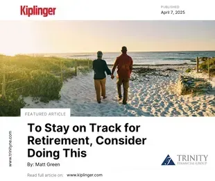 Couple walking on beach in article about staying on track for retirement.